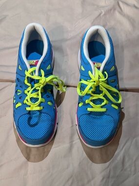 Nike Bright Blue Sneakers with Neon Yellow Laces and Pink Accents